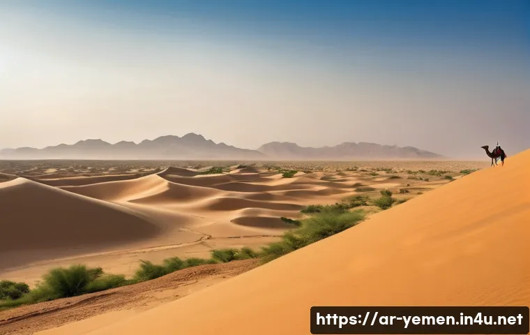 예멘 오만 국경 지역 특성 - A panoramic desert landscape at golden hour in the Yemen-Oman border region, featuring vast rolling ...